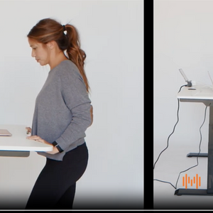 Electric White Standing Desk with woman standing 