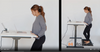 Electric White Standing Desk with woman standing 