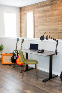 48x24 Charcoal Side Table Fixed height desk in home office with guitar amp and podcast microphone